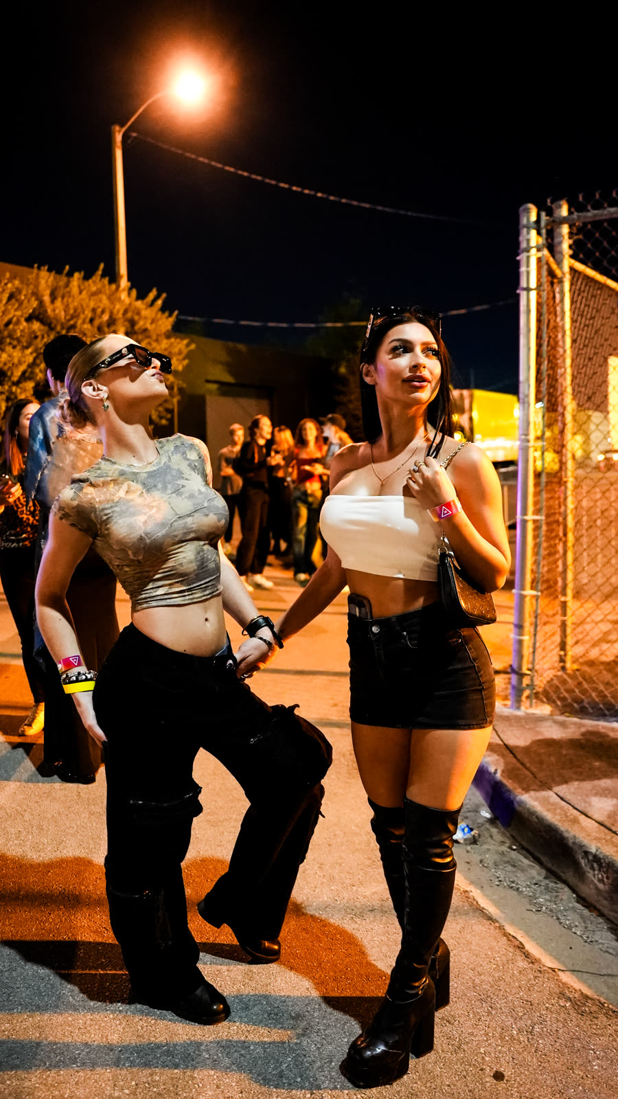 Two friends walking at night