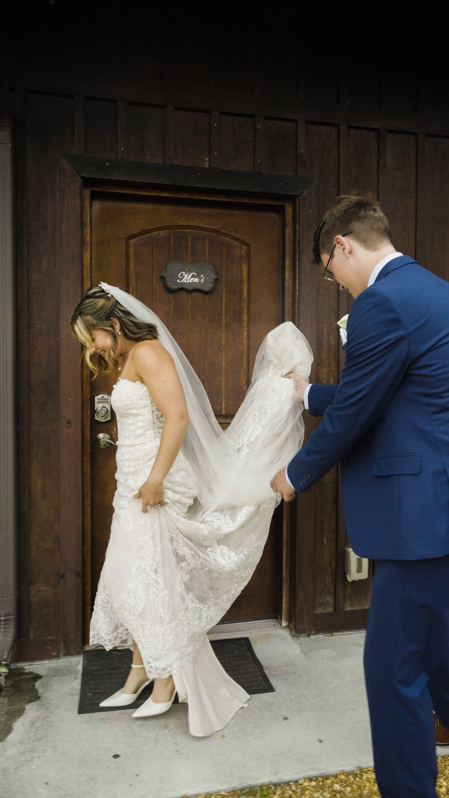 Groom carrying the bride, playful